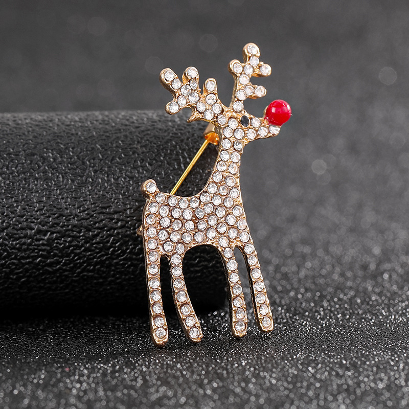 Europese en Amerikaanse grensoverschrijdende populaire kerstbroche met rendiermotief en ingelegde diamanten, schattige speld, op voorraad._voghion.com