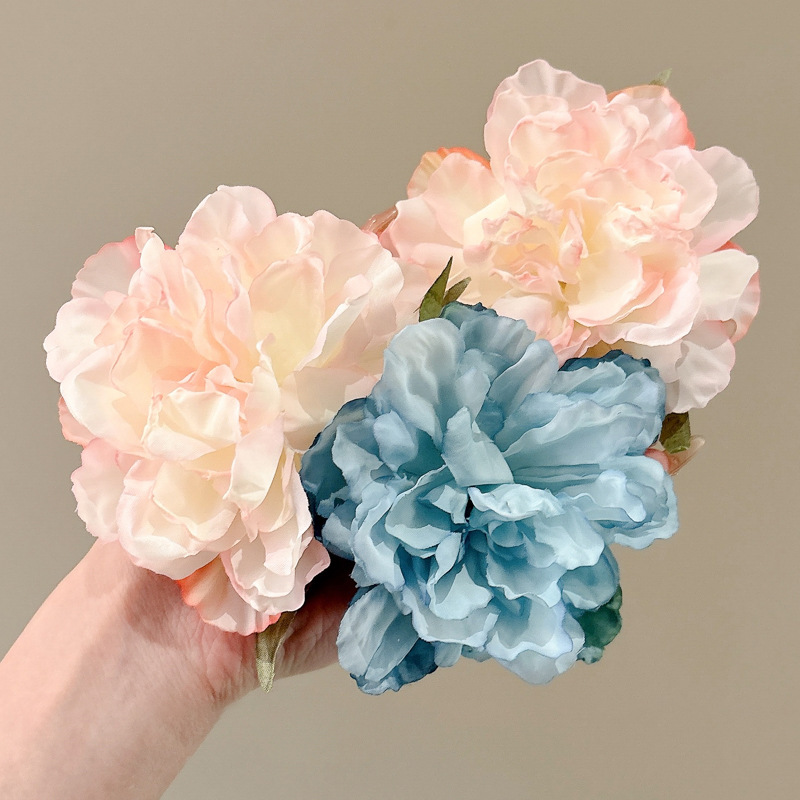 2025 brota de cabello en línea sensación de alto nivel rosa boca de pato mar de cabello cortado bordes de cabello clip de cabello flores adornamiento de cabello mujer