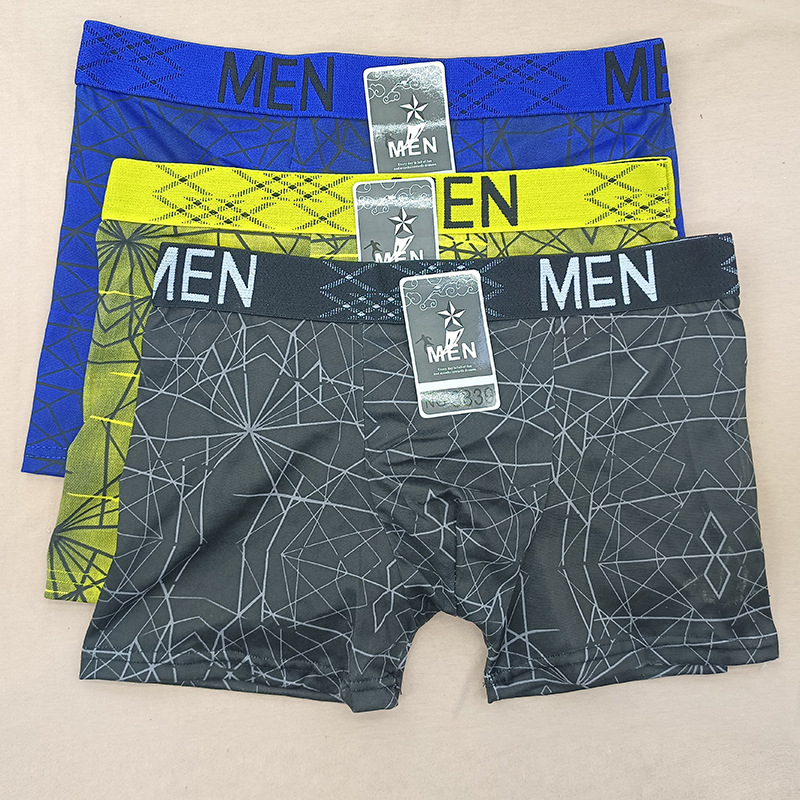 Pantalones de boxeador para hombres europeos y americanos Impresión de seda de leche tamaño libre pantalones de cuatro lados para hombres puestos de bajo precio transfronterizos especiales