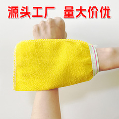 使い捨てのバスタオルの片面の黄色の手袋の単層のバスタオルは背中をこすります。