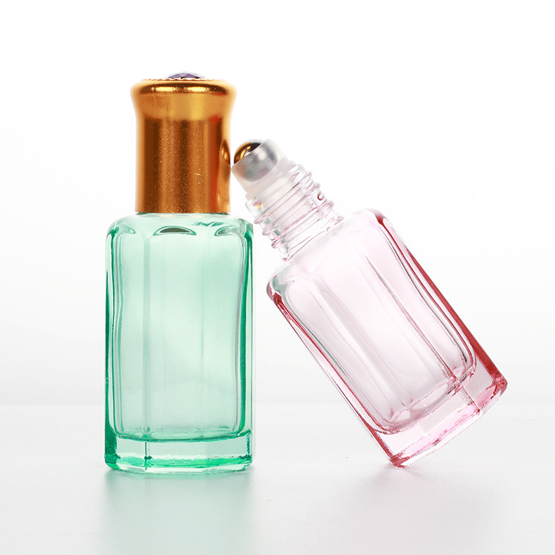 Botella de bola de rodillo de 10ml botella de perfume de aceite esencial de vidrio engrosado colorido sub-botella de viaje pequeña botella vacía botella de cuentas de muestra de masaje