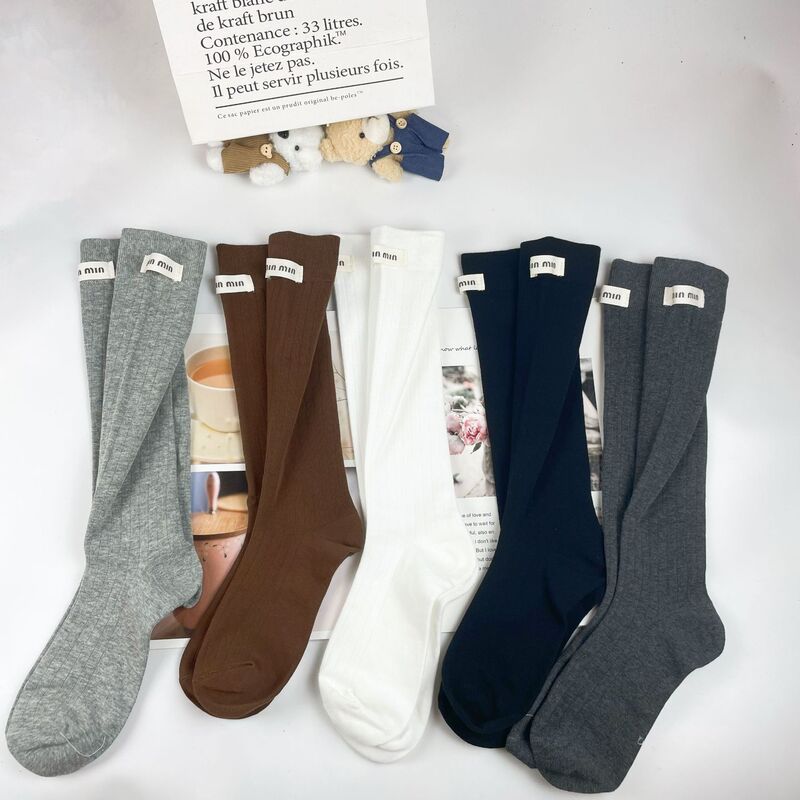 New Autumn and Winter Ribbed Vertical Stripe Trendy Color Mocha Calf Socks High Boot Socks Long Tube Slouch Socks Letter Fabric Label Socks New Autumn and Winter Ribbed Vertical Stripe Trendy Color Mocha Calf Socks High Boot Socks Long Tube Slouch Socks Letter Fabric Label Socks