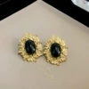 22#Silver needle black medium elliptical earrings