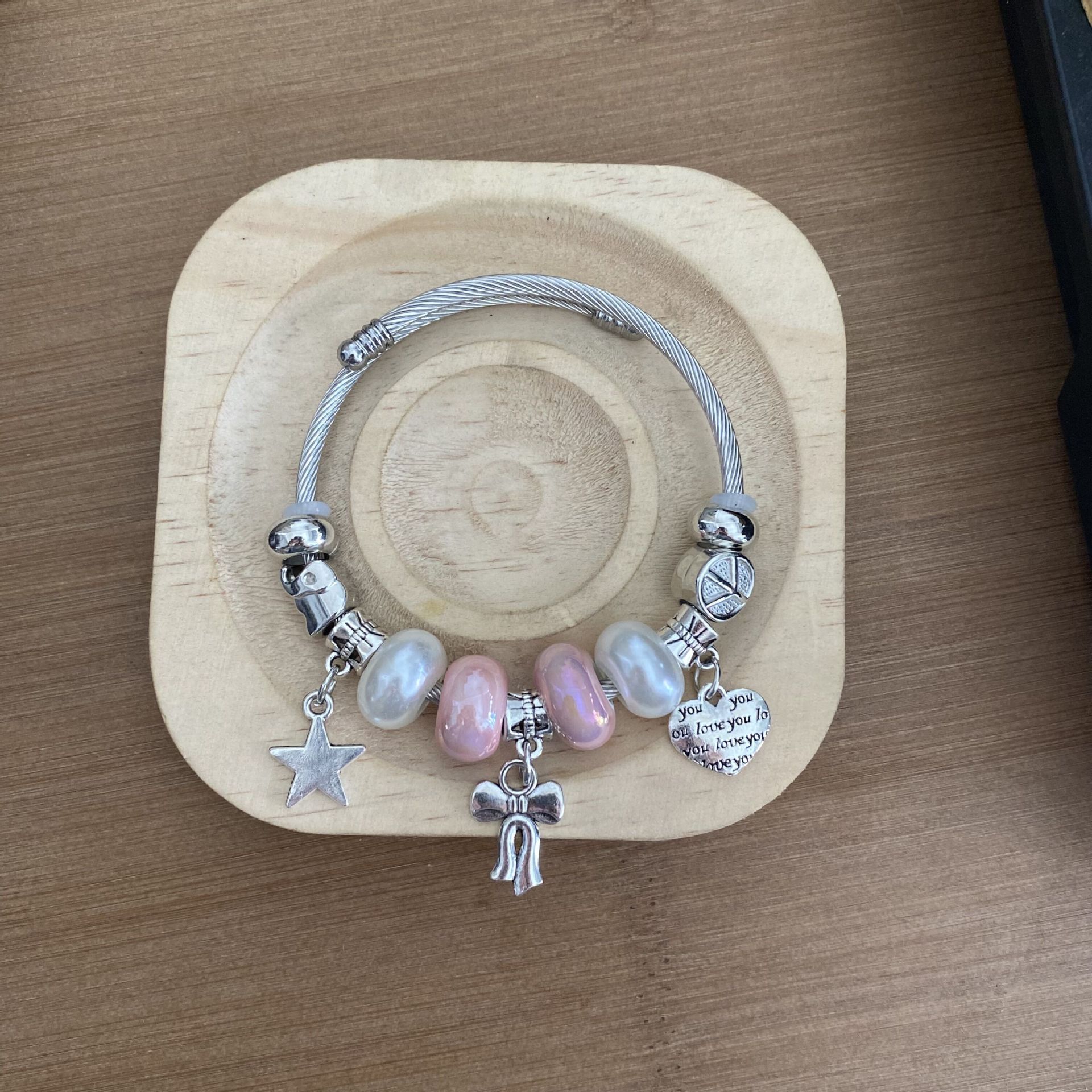 Nicho de la moda versátil pulsera de alto grado de lujo luz diseño personalizado pulsera de Saturno abierto de diamantes incrustado transfronterizo