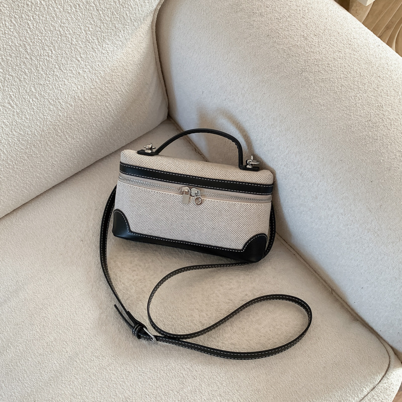 Bolso de mano de alta sensación 2026 nuevo lienzo de moda bolso de color pequeño bolso cuadrado de viaje bolsa de mochila ocio