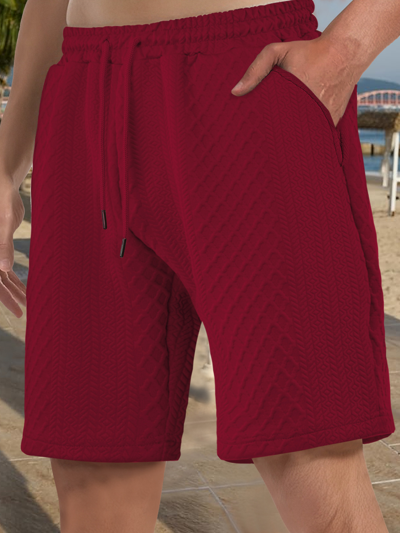 Europa y Estados Unidos ropa de hombre transfronteriza spot verano suelta pantalones cortos de color sólido jacquard correa de hombre casual pantalones cortos de playa