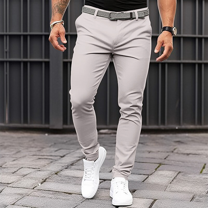 Europa y América estación independiente transfronteriza de los hombres de color sólido bolsillo apretado cremallera negocio casual slim fit pantalones pequeños