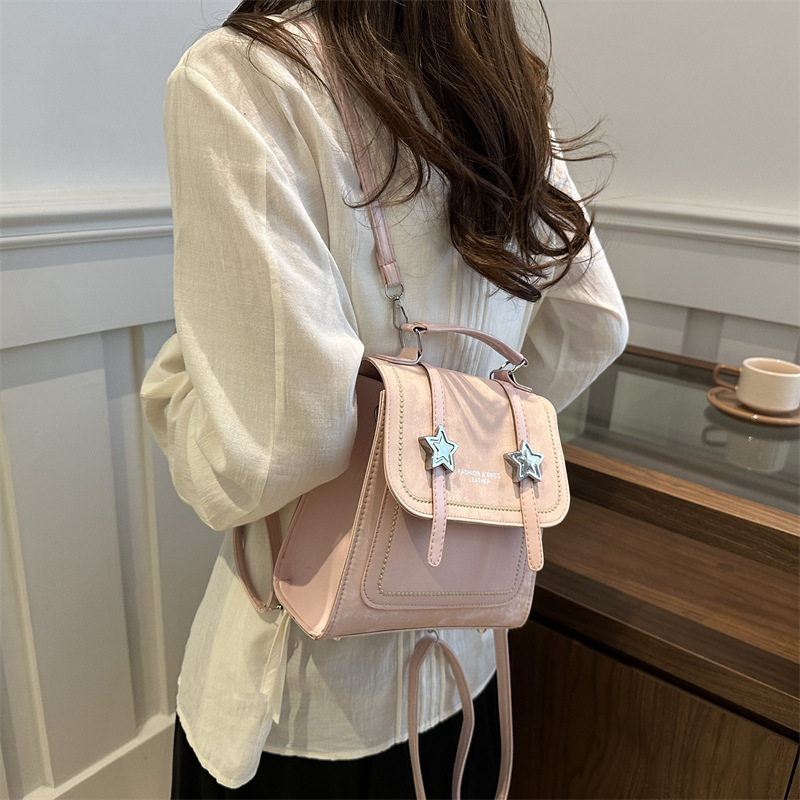 Mochila pequeña 2024 nuevo estilo de diseño de moda nicho de viaje bolsas escolares ligeras para mujeres ins para salir mochila pequeña