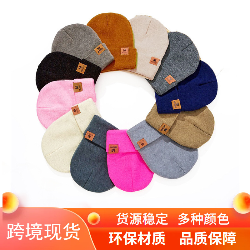 亚马逊新款秋冬字母皮标男士针织帽跨境户外保暖冷帽女时尚毛现帽