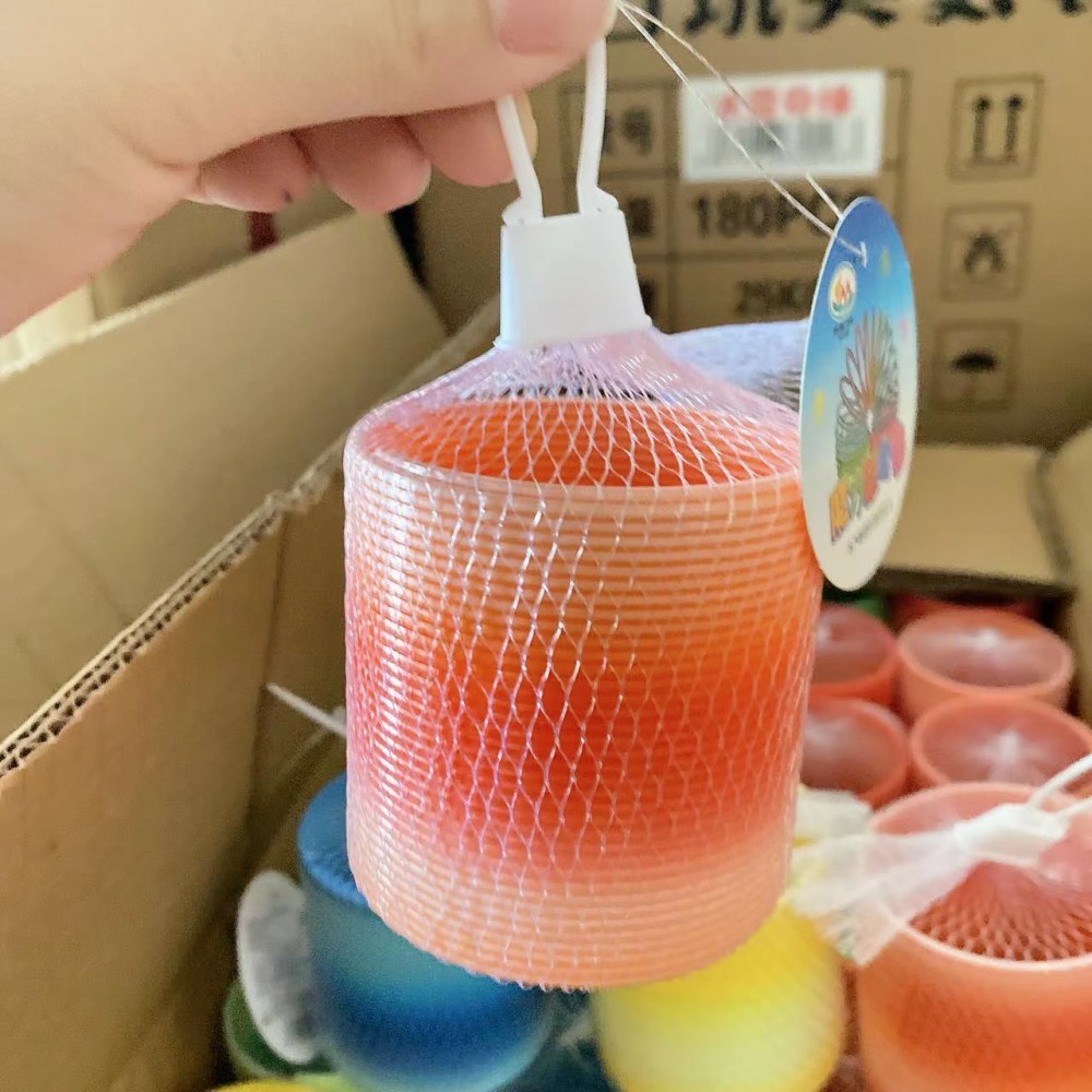 Educativo de los niños del arco iris mágico anillo Jenga regalo puesto juguete resorte elástico 2 yuanes tienda por lotes image 4