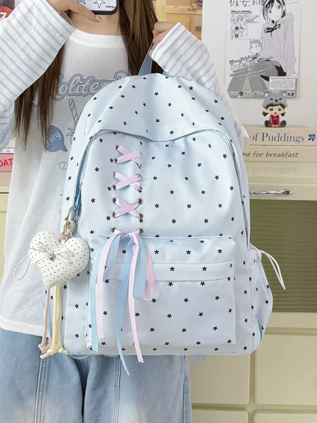 Highly stylish polka dot backpack for junior high school girls, with bow tie, large capacity, trendy and unique, lightweight school backpack