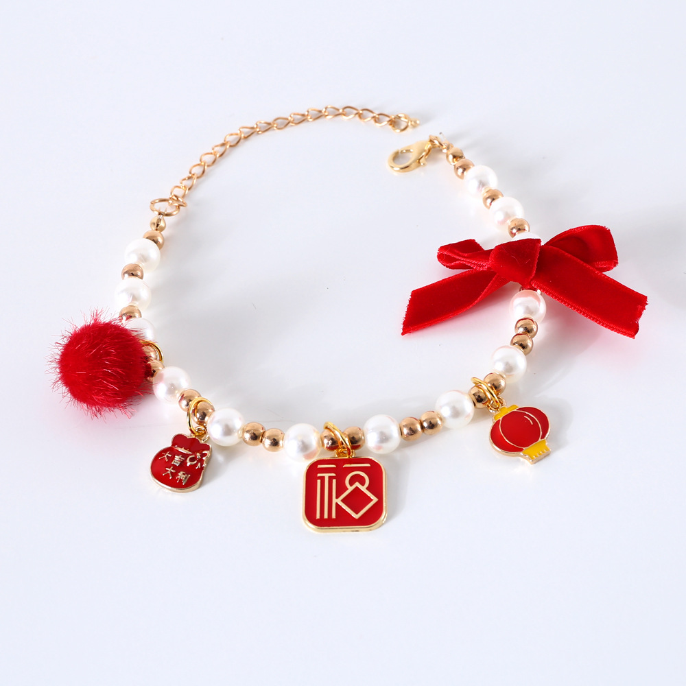 Perla de seda de mascota arco de Año Nuevo colgante de Navidad gato perro conejo collar accesorios de collar ajustable del Festival de Primavera