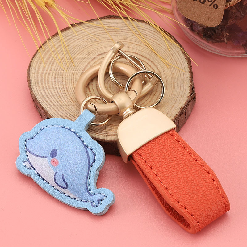 Nuevo llavero de piel de cordero francés pequeño llavero fresco colgante mini bolso corto colgante pequeño joyería