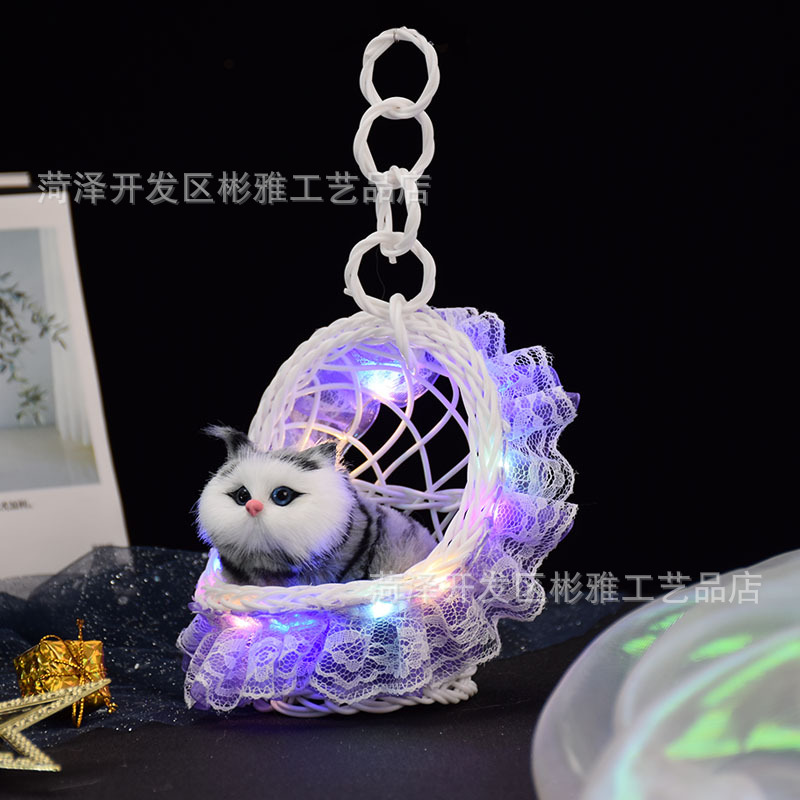 Cestas luminosas con lámparas y llamadas gatitos, simulación de gatos, juguetes luminosos para niños, estandos, puntos de venta.