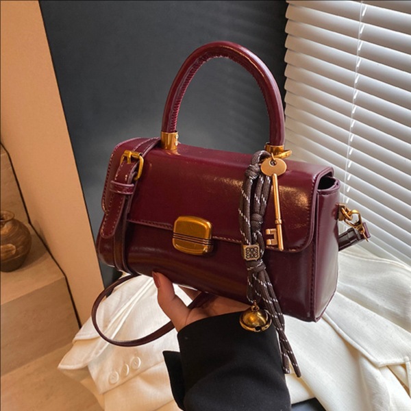 Coreana alta sensación retro bolso mujer 2026 nuevo lujo ligero versátil bolso de mochila de moda bolso de mano