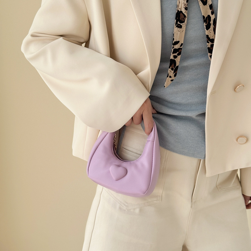 Bolso de amor de la princesa de aire exterior compacto mini bolso de cambio de moda de color sólido 2026 bolso de comercio exterior transfronterizo para niños