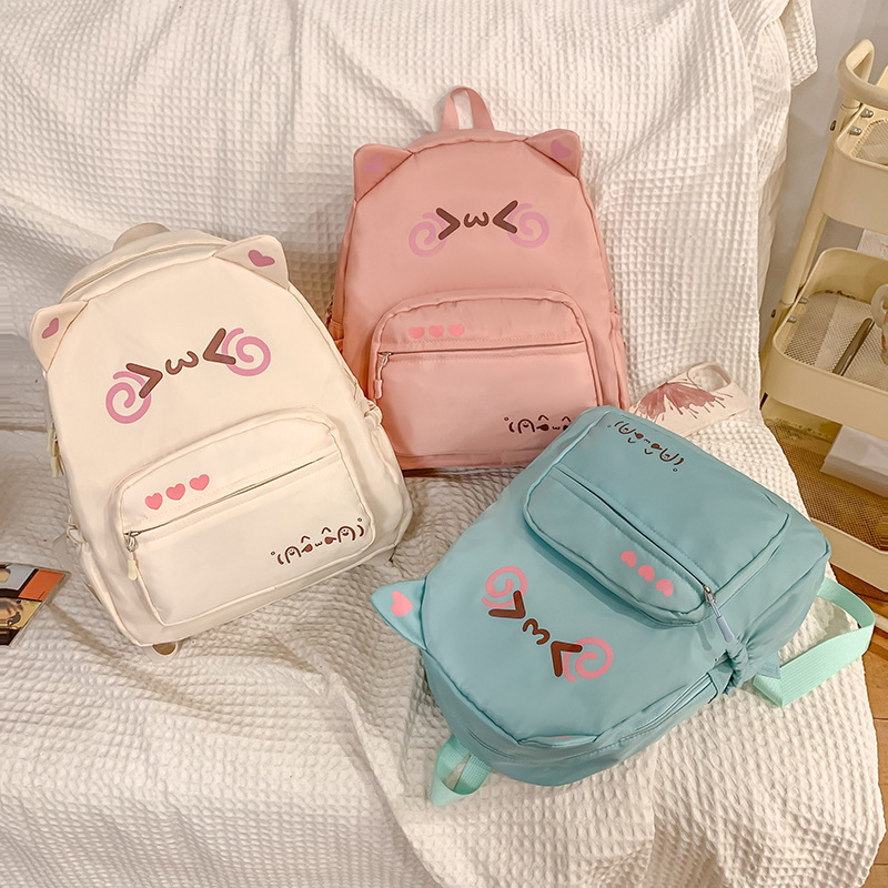 2024 New Japanese Cute Yan Text Small Expression All-match Backpack Student Soft Girl Primary School Student Backpack Schoolbag