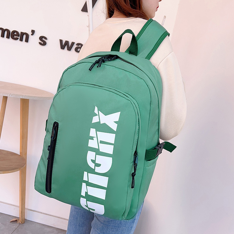 Mochila de moda de moda para hombres 2023 nueva mochila de hombro femenina de gran capacidad de letras de escuela secundaria mochila escolar