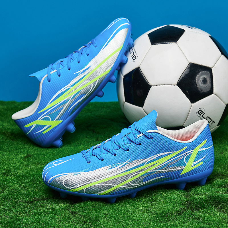 Zapatos de fútbol transfronterizos para niños juveniles juegos de entrenamiento físico entrenamiento de niños pequeños zapatos deportivos al por mayor