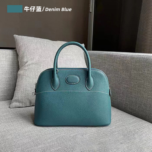 New Arrival Litchi-Grain Genuine Leather Bowling Ball Shell Bag  
Premium Full-Grain Cowhide Tote with Zipper Closure  
Spacious Casual Women's Handbag