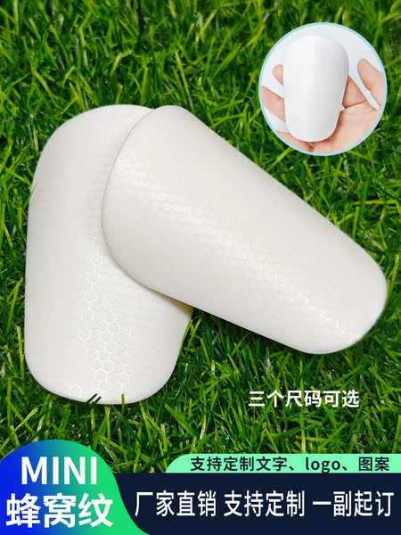Cross-border MINI honeycomb football shin guards, training shin guards, calf guards for students and adults, competition sports protective gear wholesale