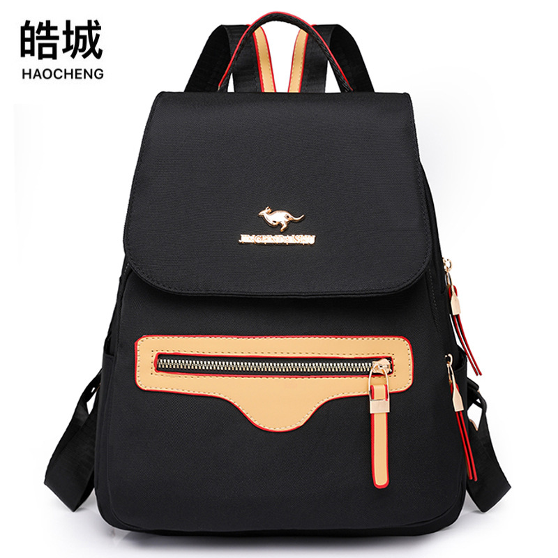 Mochila de nailon para mujer 2024 nueva mochila de viaje simple y de moda mochila de viaje de gran capacidad antirrobo al por mayor