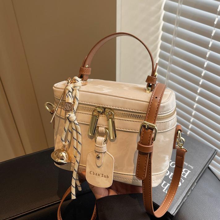 Este año, la popularidad de la bolsa de mano para mujeres 2025, nueva bolsa de hombro de tendencia universal, alta humedad, bolsa de cubo de moda