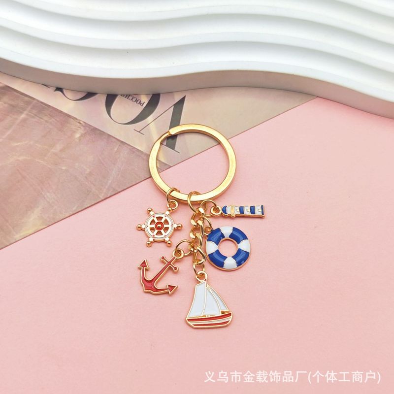 国境を越えた航海帆船のキーホルダーに油を垂らした金属灯台救命輪船舵文創プレゼントバッグストラップ飾り|undefined