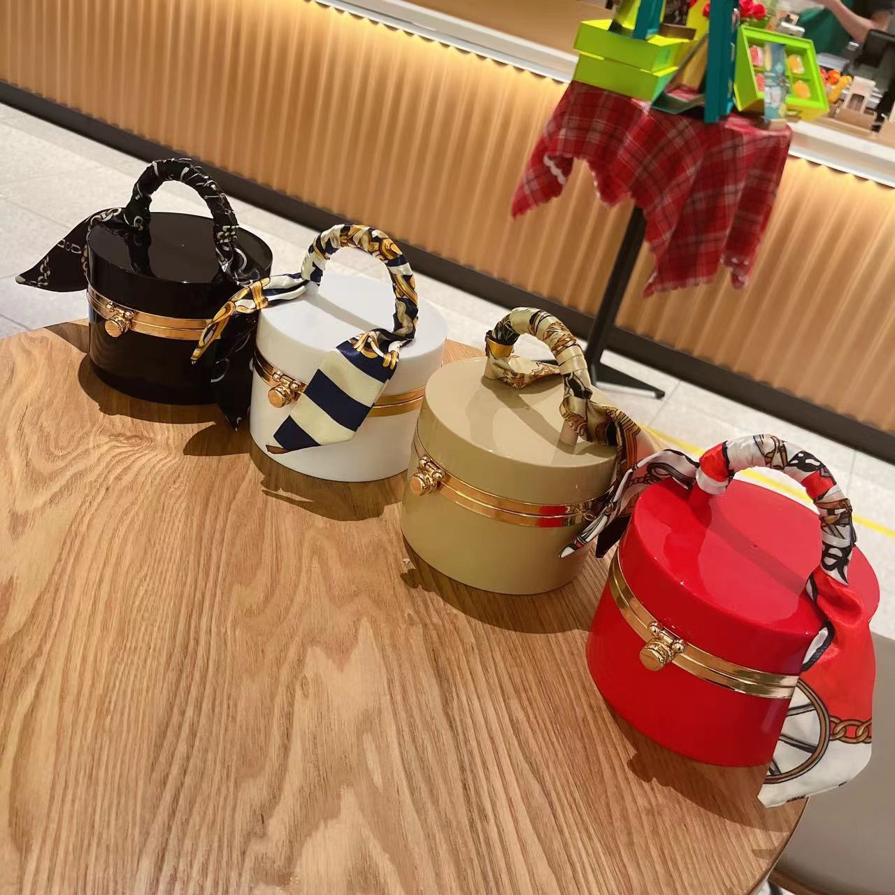 The 2025 new style women's bag is a trendy and fashionable candy-colored acrylic bag, a hand-held silk scarf, a lockable dinner bag, and a box bag Item Picture