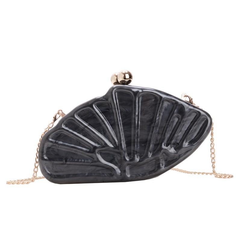 Bolsa de cena de lujo ligera transfronteriza para mujeres Europa y los Estados Unidos nuevo tipo de bolso de cena de hombro de concha de abanico de acrílico