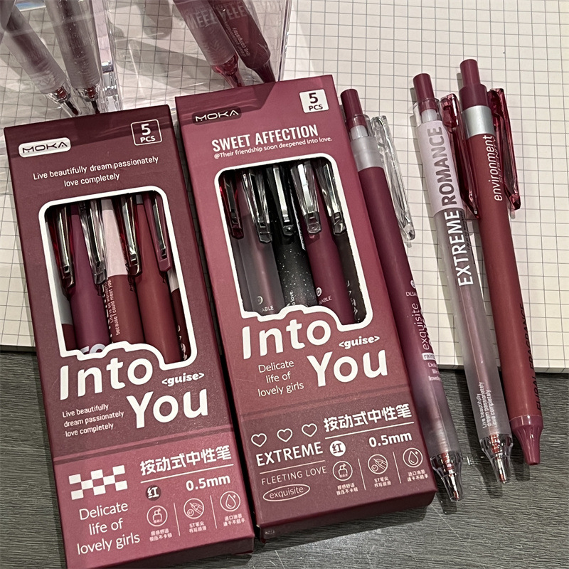 Bolígrafo rojo para cambiar el mal viento bolígrafo rojo simple bolígrafo rojo de alto valor de los estudiantes maestros bolígrafo rojo corazón de la niña