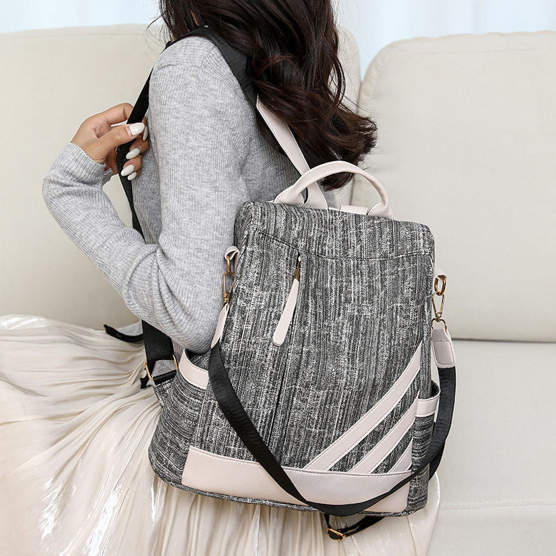 Fábrica al por mayor 2024 nueva mochila coreana para mujer simple y versátil mochila de un solo hombro de viaje en color de contraste de gran capacidad