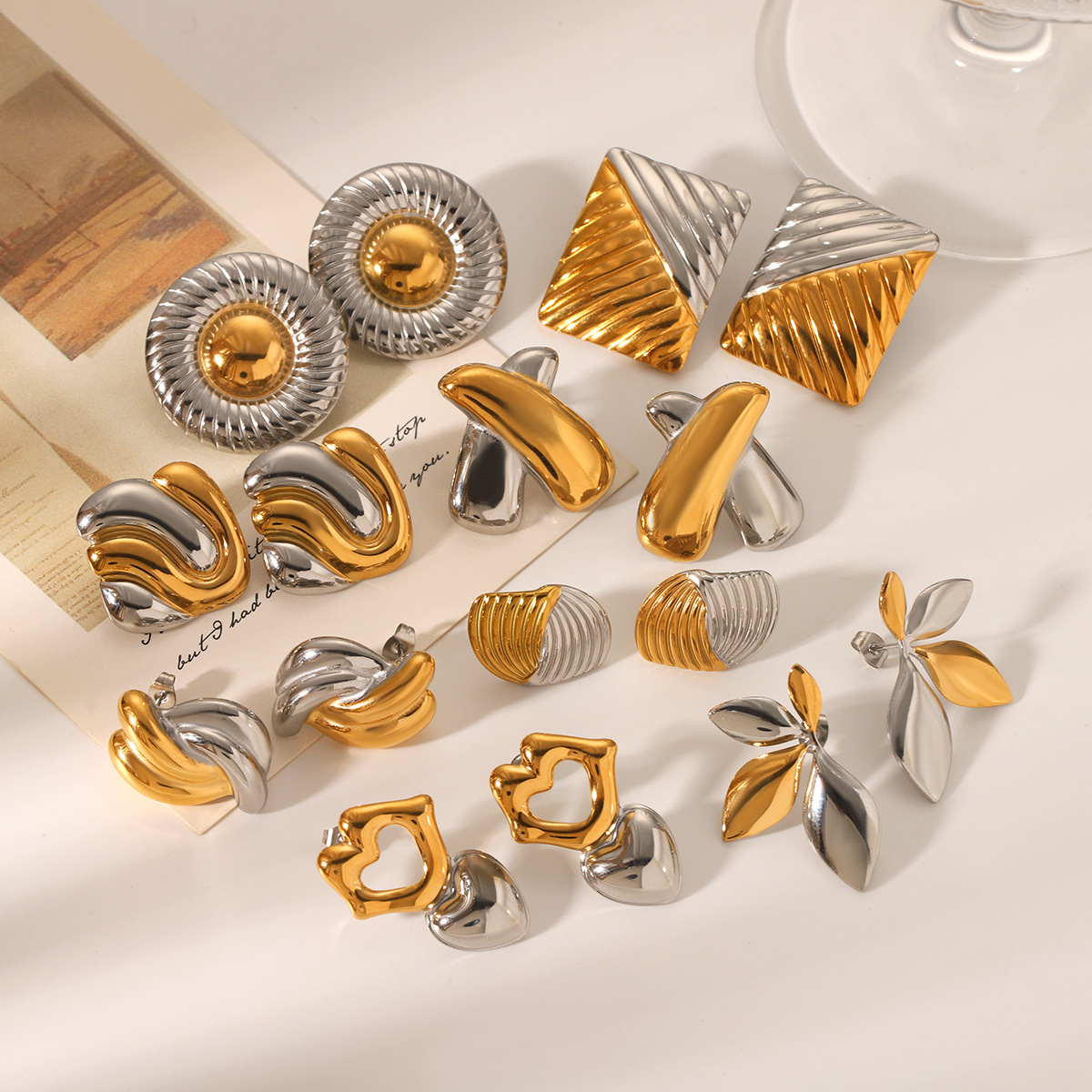 Oro y plata de Europa y América, pendientes de acero inoxidable de color geométrico, nicho femenino, pendientes de acero de titanio de alta calidad, joyas transfronterizas no se desvanecen