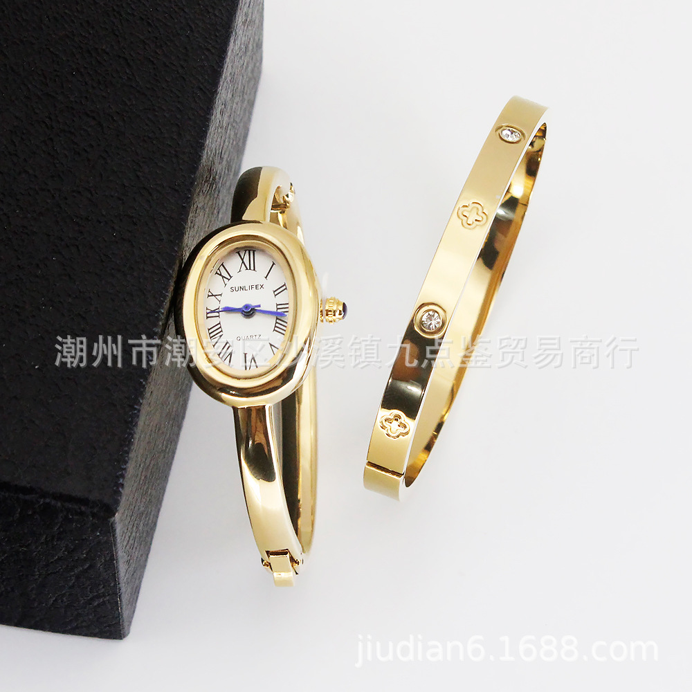 Gold strap white dial watch + bracelet