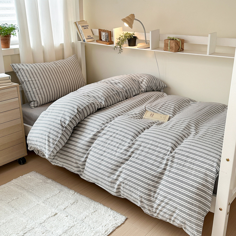 Tejido y lavado con agua Xinjiang algodón estudiantes tres piezas colchón sin aire impreso algodón dormitorio estudiantes piezas necesarias