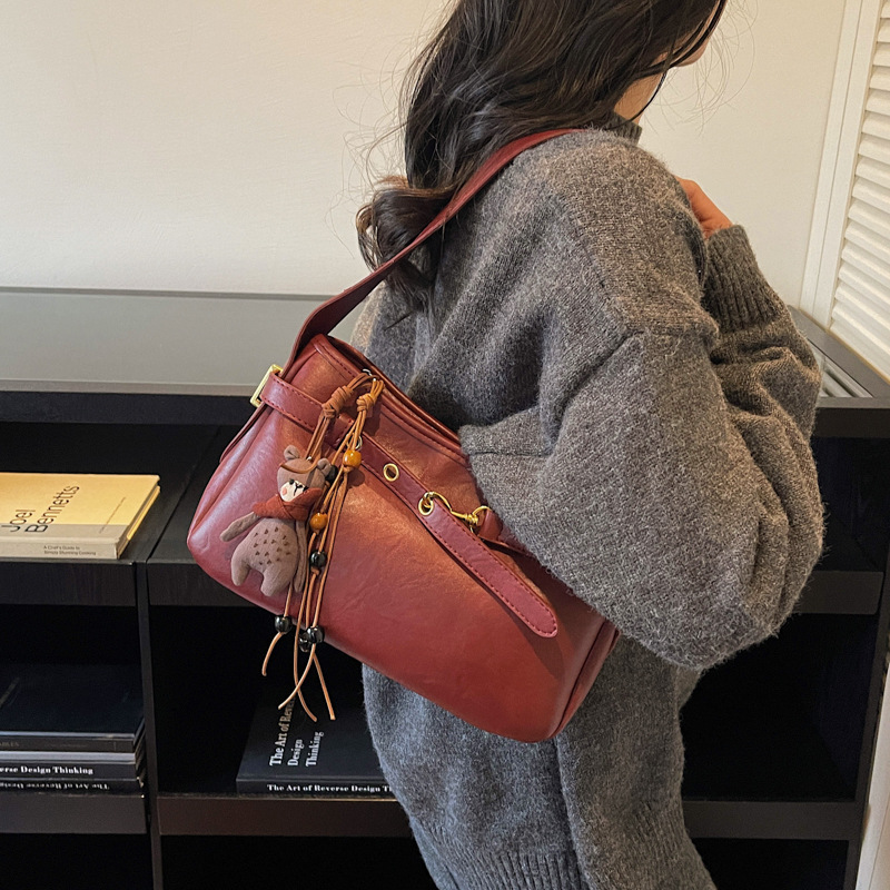 Transfronterizos retro temperamento alto bolso de brazo de mujer 2025 invierno nuevo gran capacidad versátil mochila de viaje