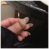 Golden ring with pigtail, diamond encrusted