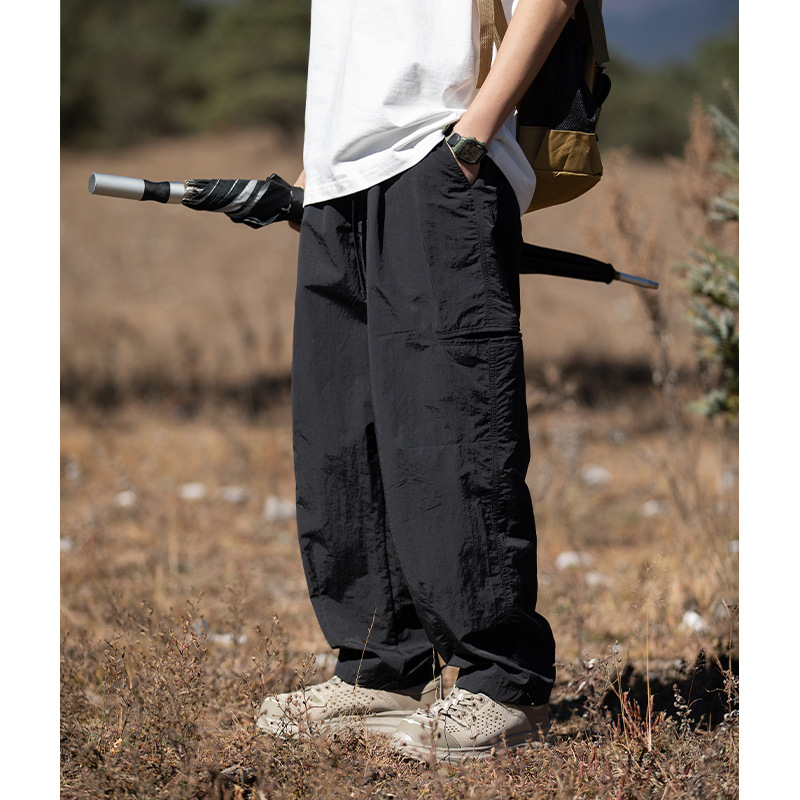 Pantalones casuales rectos al aire libre de montaña primavera para hombres nuevo estilo japonés diseño de cinturón de hebilla suelta pantalones de viento funcionales