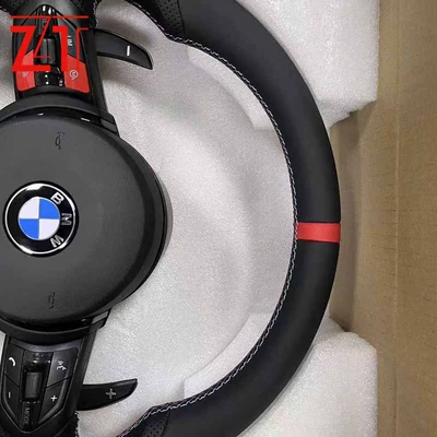 Steering wheel wheel assembly with red M