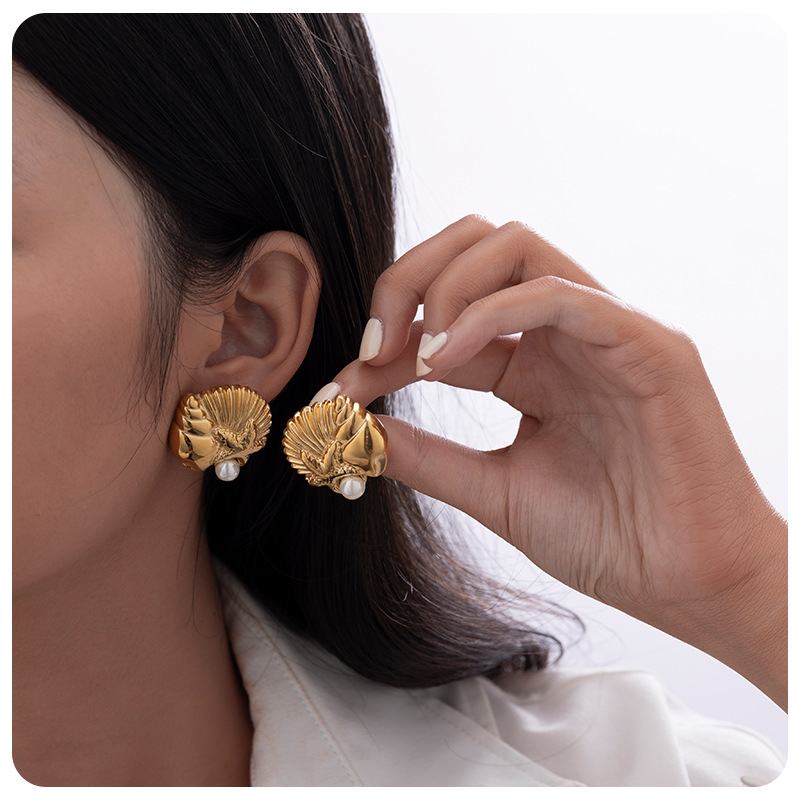 TENA Europa y América de moda conchas de diseño de estrellas de mar explosivo orejetas de acero inoxidable chapado en oro 18 quilates temperamento de orejetas marinas mujeres