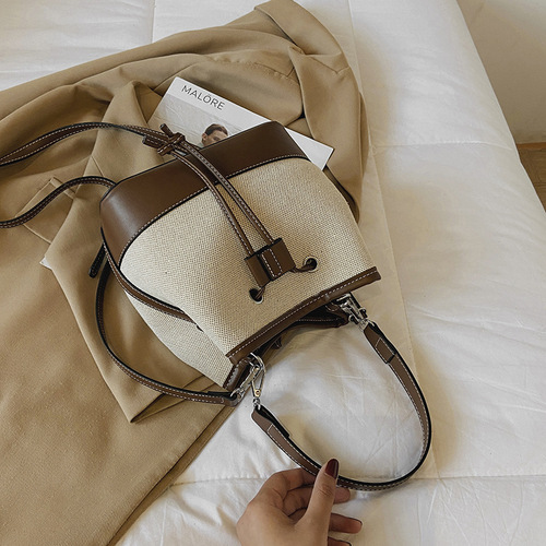 Wholesale women's bags autumn new European and American fashion bags crossbody bag drawstring stitching canvas portable bucket bag