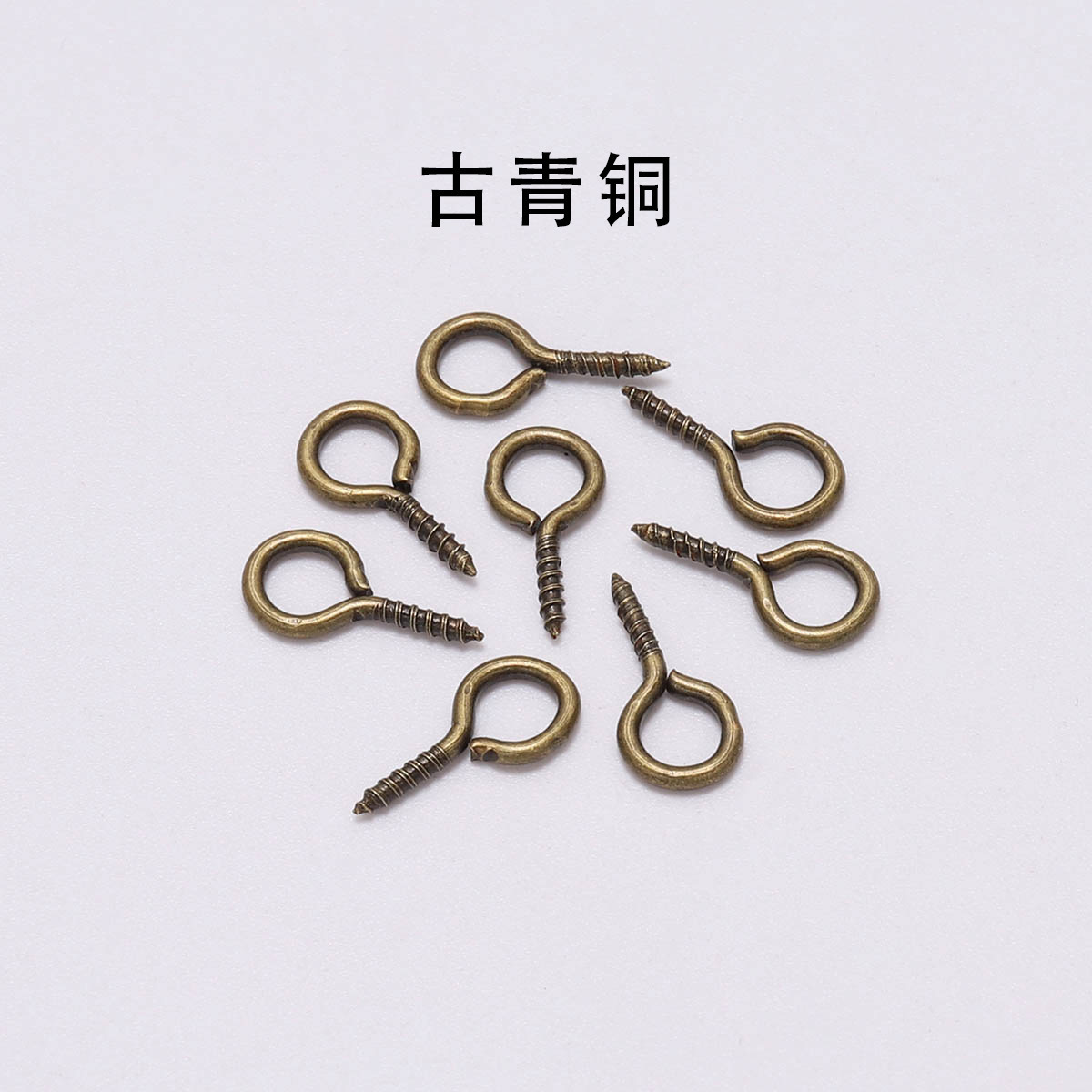 Unos 50 clavos de ojos de oveja de color bronce (7.3g)