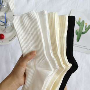 Women's white mid-calf socks ins trendy spring, autumn and winter solid color pile socks Japanese style all-match boneless solid color stockings