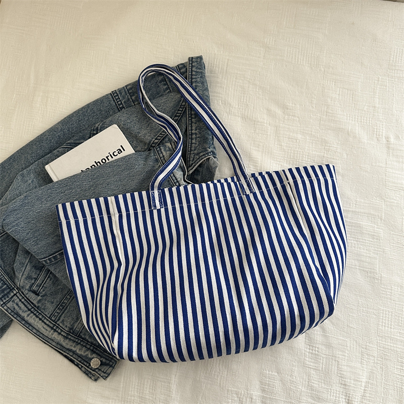 Bolsas de lona a rayas de otoño de mujeres bolsas 2024 nuevas bolsas de mano populares bolsas de hombro casuales de gran capacidad bolsas tote
