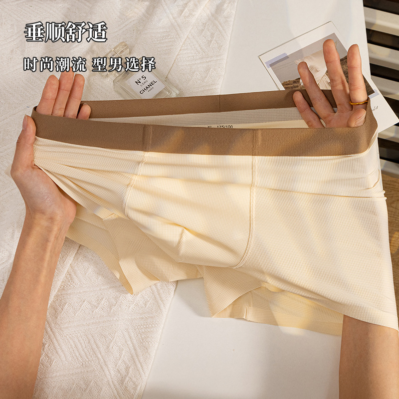 Nueva ropa interior de hombre sin costuras de seda de hielo waffle, ropa interior de entrepierna transpirable cómoda, pantalones cuadrangulares agradables para la piel de cintura media para hombre