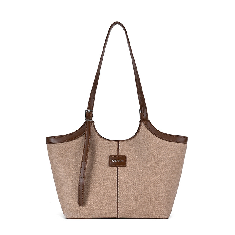 Bolsa de mano retrógrada de nicho para mujeres 2026 comercio exterior nuevo color de choque de alta calidad bolso de hombro de gran capacidad
