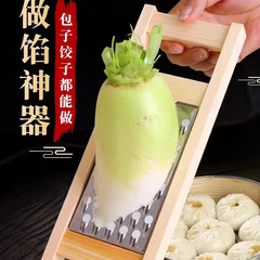古い拭き大根餃子の神器料理器の野菜を切って糸を拭く器の丸い穴の木のステンレスの実木の家庭用