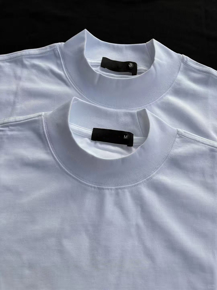 เสื้อยืดแขนสั้นคอเต่าสไตล์อเมริกัน 2026 สำหรับผู้ชาย ผ้าหนา ทรงหลวม ไหล่ตก สไตล์มินิมอล สีพื้น แมตช์ทุกลุค ใส่เป็นเสื้อตัวในไซส์โอเวอร์ไซส์