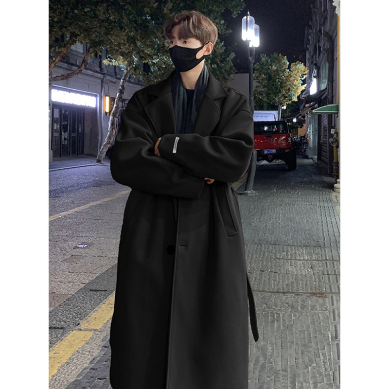 韓国版百合の中長のウインドブレーカーの男性の秋冬のタイプは膝の英倫の風毛のコートを過ぎてゆったりとしています。