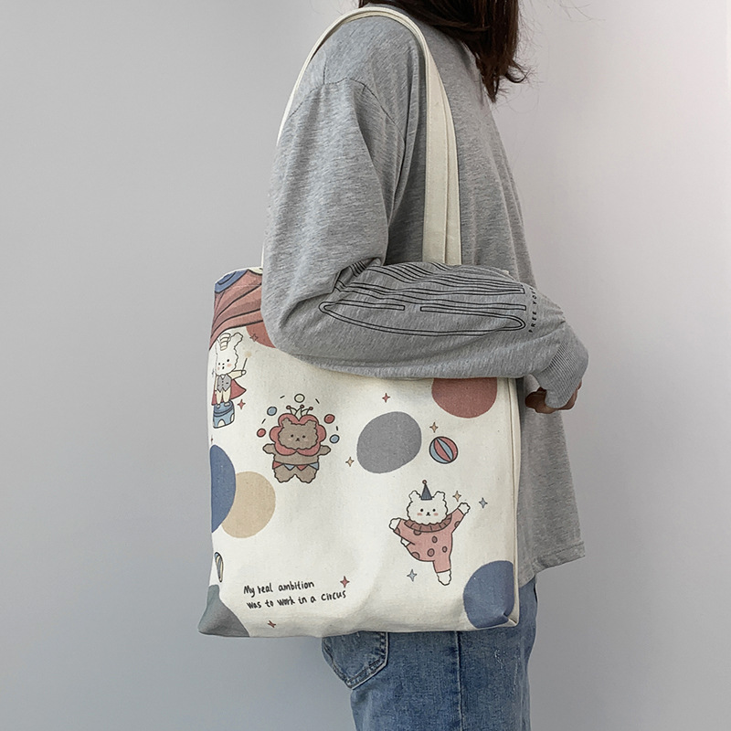 Bolsa de lona para mujer con un solo hombro estilo japonés nicho ins clase de estudiante de gran capacidad estilo coreano portátil todo partido lindo bolsa de compras